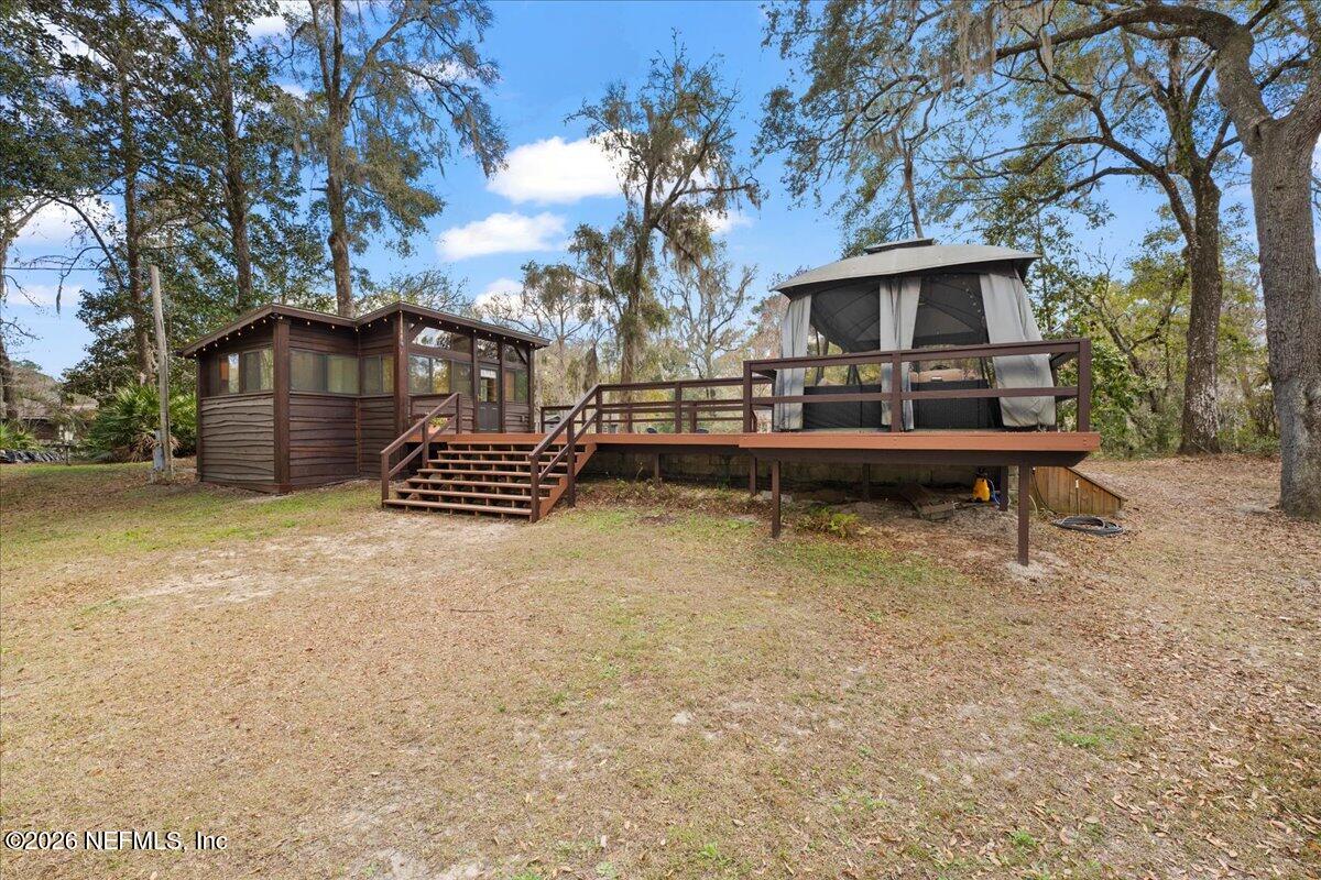 4229 Lazy Acres Road Middleburg, FL 32068 - Photo 22 of 41 a front view of a house with a yard