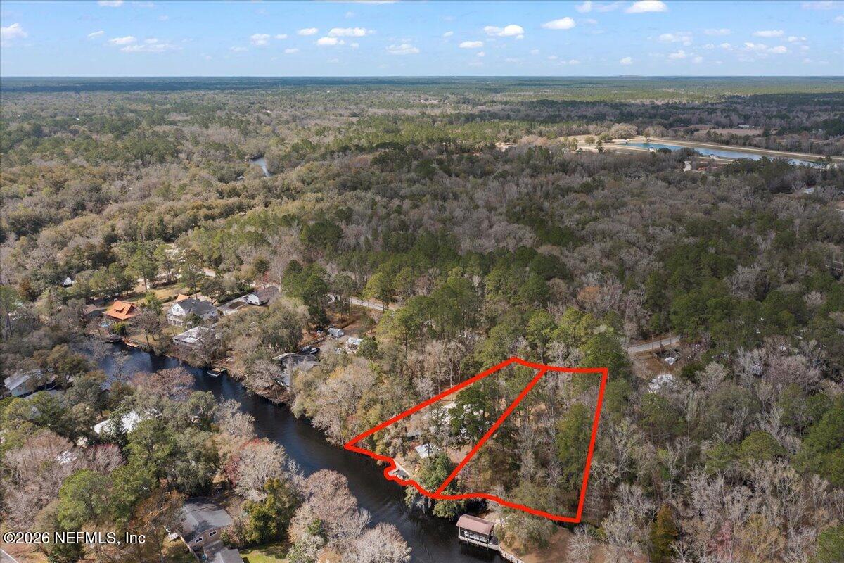 4229 Lazy Acres Road Middleburg, FL 32068 - Photo 38 of 41 an aerial view of a houses with a yard