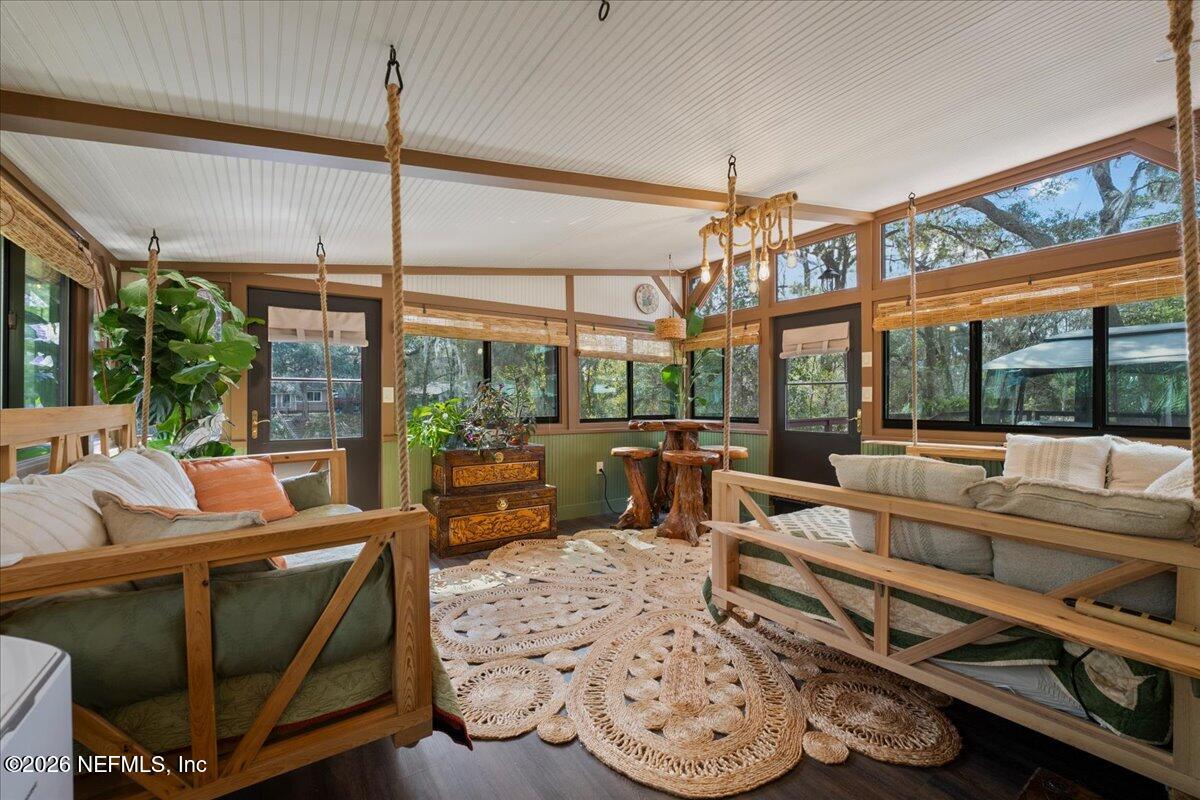 4229 Lazy Acres Road Middleburg, FL 32068 - Photo 6 of 41 a living room with furniture a large window with outer view