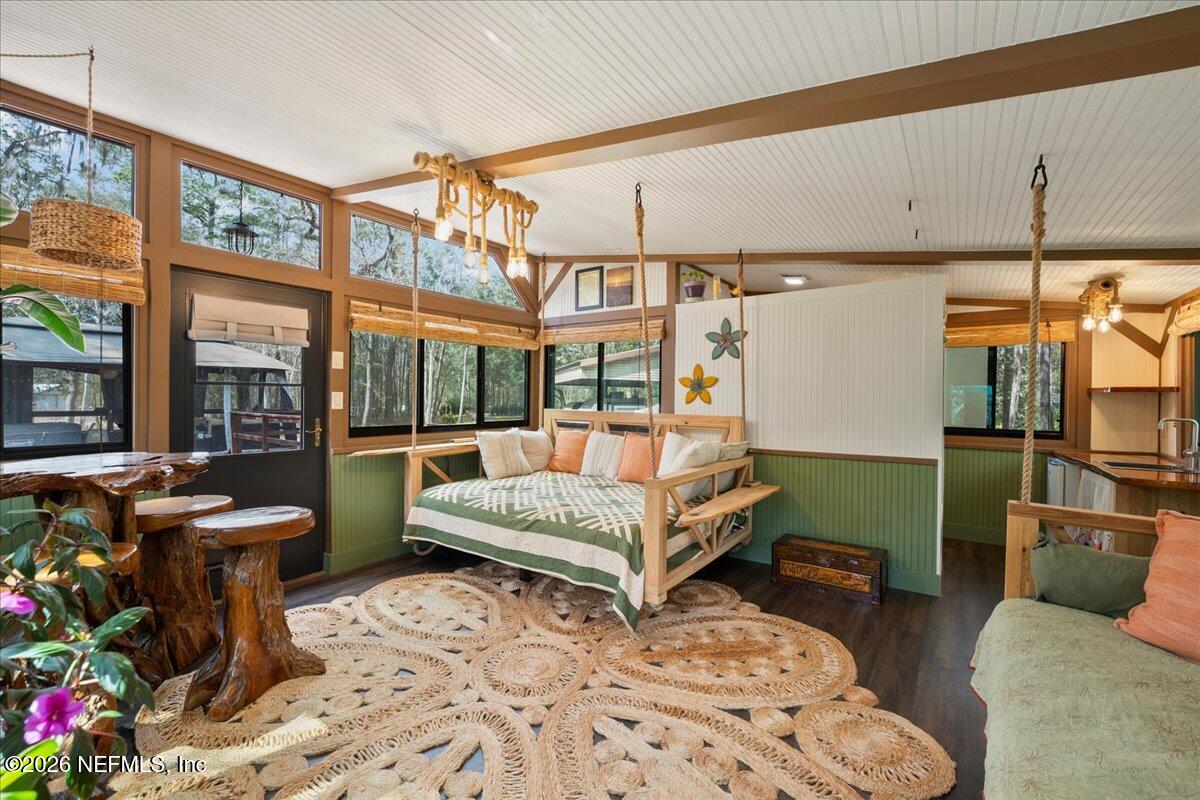 4229 Lazy Acres Road Middleburg, FL 32068 - Photo 7 of 41 a bedroom with furniture and a window