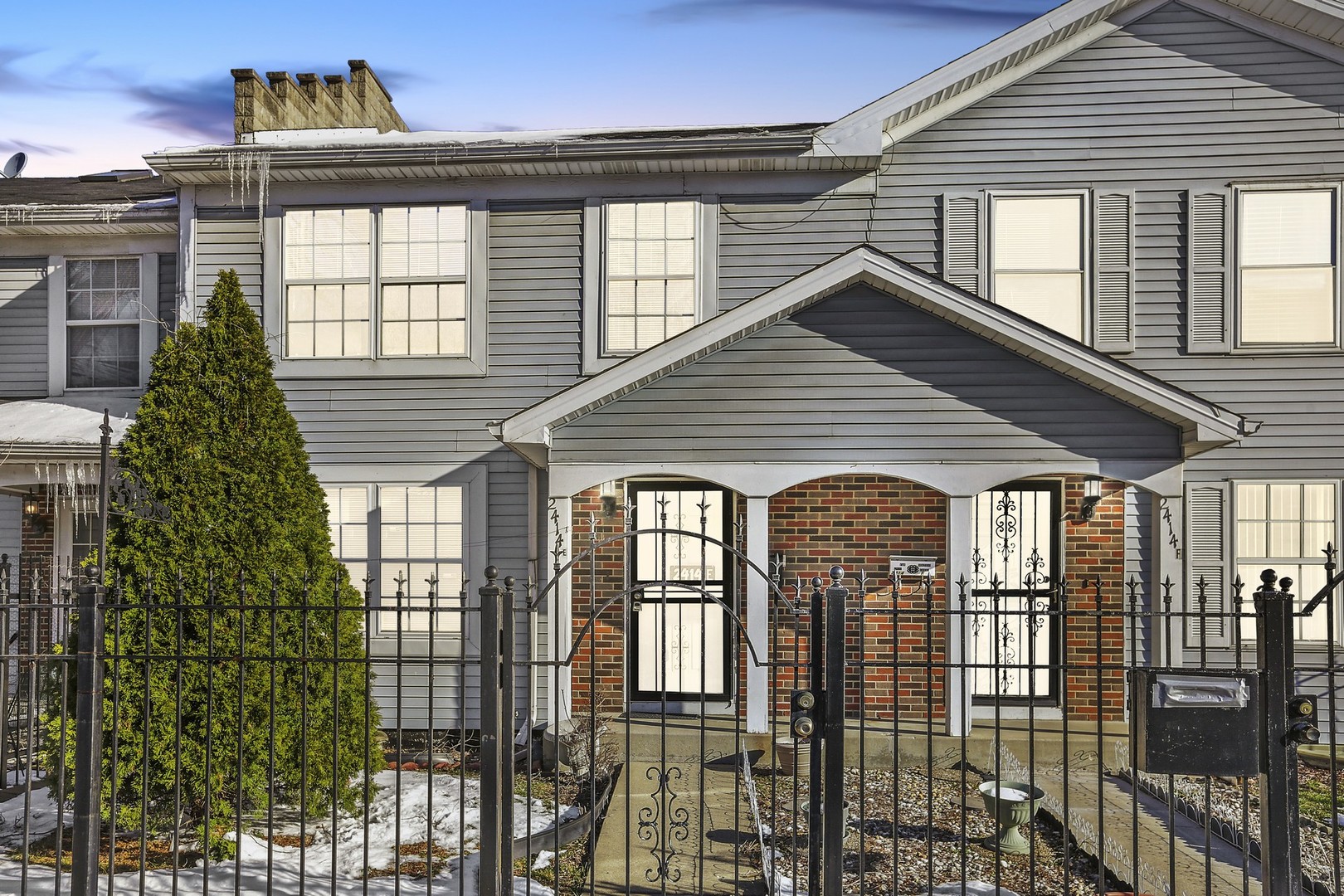 2414 West Harrison Street, Unit E Chicago, IL 60612 - Photo 1 of 15 front view of a house