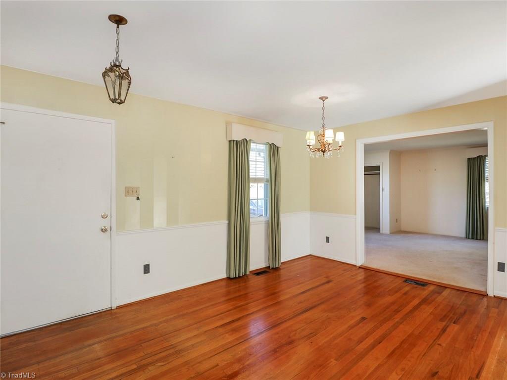 511 Edney Ridge Road Greensboro, NC 27408 - Photo 3 of 26 Dining room looking into living room.