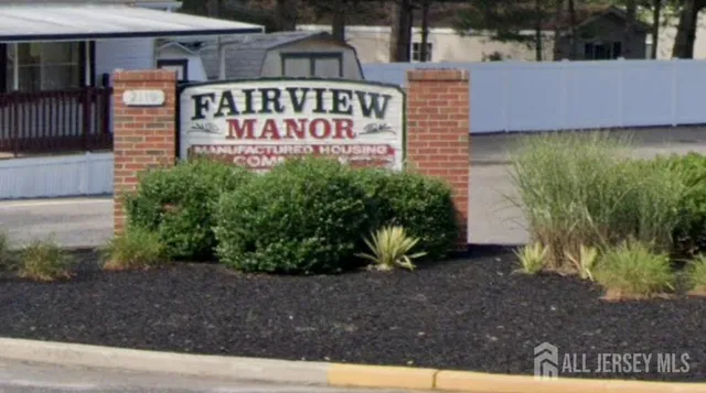 a sign on the side of a road
