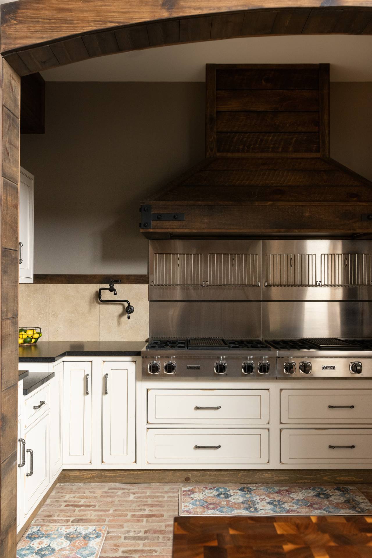 254 Mitchell Lane Bridgehampton, NY 11932 - Photo 8 of 36 a stove top oven sitting inside of a kitchen