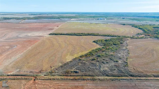 a view of a lake with a beach