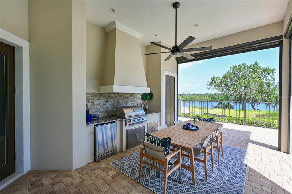 11807 Rive Isle Run Parrish, FL 34219 - Photo 33 of 57 a view of a dining room with furniture window and outside view