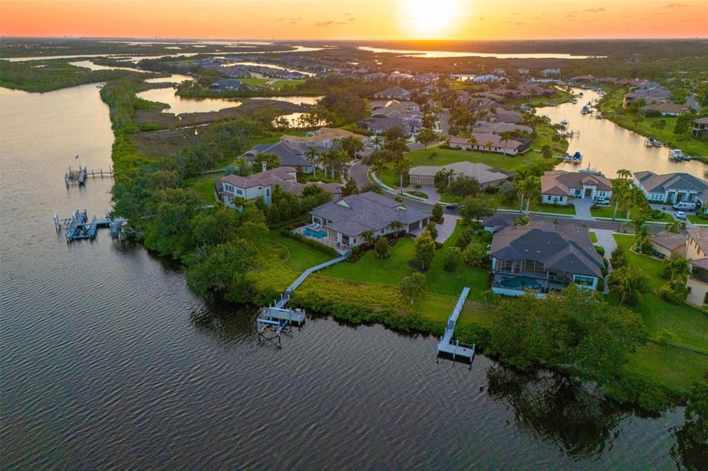 11807 Rive Isle Run Parrish, FL 34219 - Photo 57 of 57 an aerial view of lake residential houses with outdoor space and river