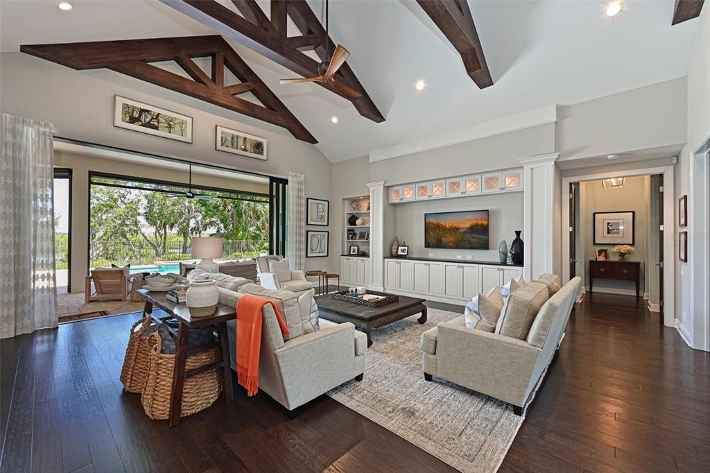 11807 Rive Isle Run Parrish, FL 34219 - Photo 6 of 57 a living room with furniture and a large window