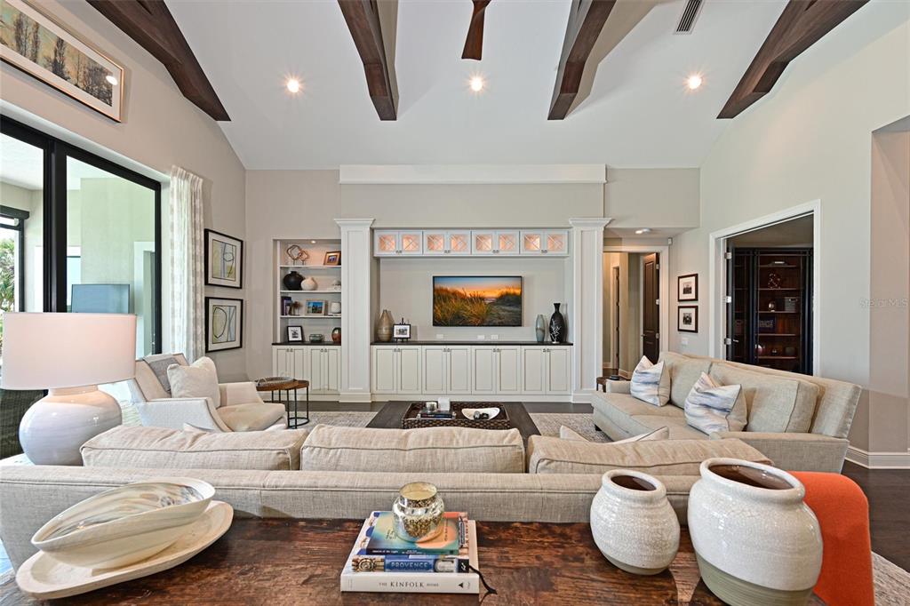 11807 Rive Isle Run Parrish, FL 34219 - Photo 8 of 57 a living room with furniture and a large window