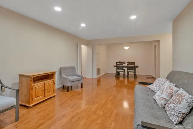 a living room with furniture and a table