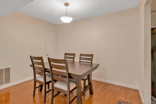 a view of a dining room with furniture