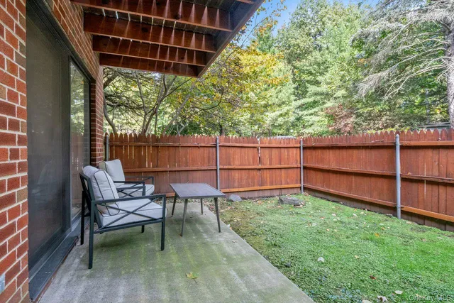 a garden view with a seating space