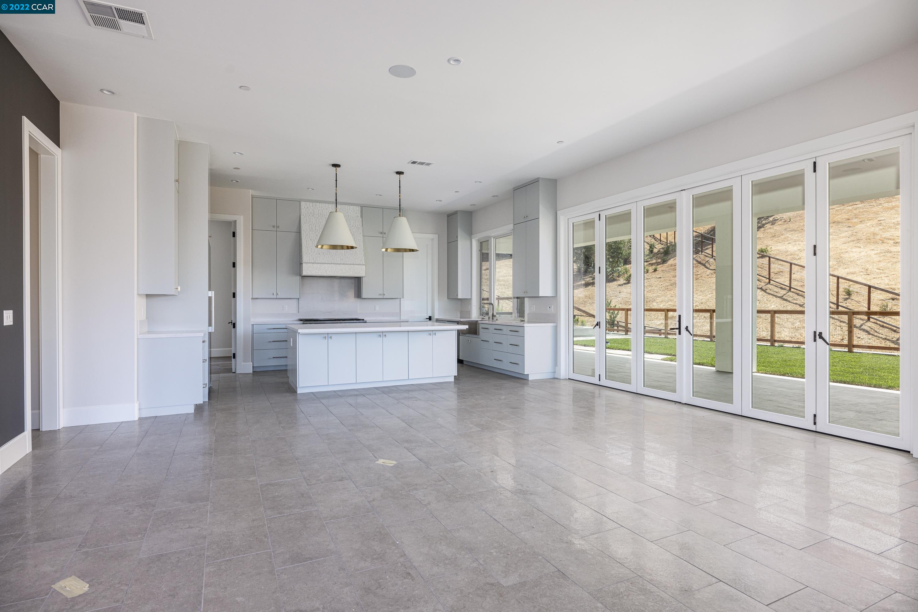 145 Arbor View Lane Lafayette, CA 94549 - Photo 13 of 46 a view of a kitchen with large windows