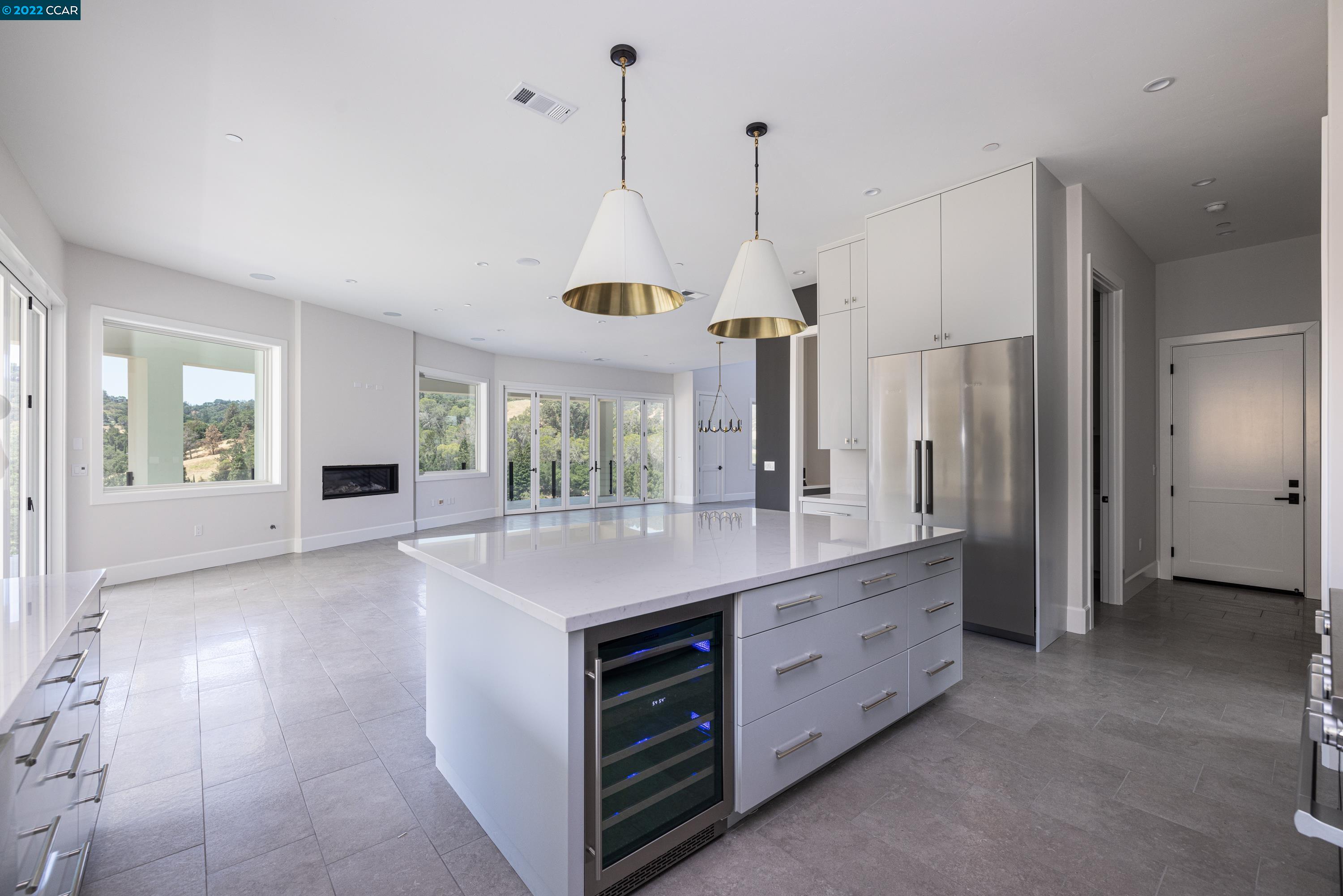 145 Arbor View Lane Lafayette, CA 94549 - Photo 18 of 46 a kitchen with kitchen island a counter space a sink appliances and a window