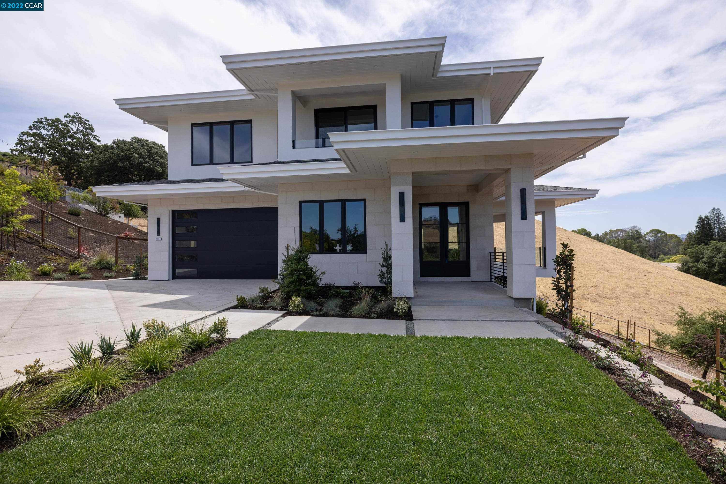 145 Arbor View Lane Lafayette, CA 94549 - Photo 2 of 46 a front view of a house with a yard and porch