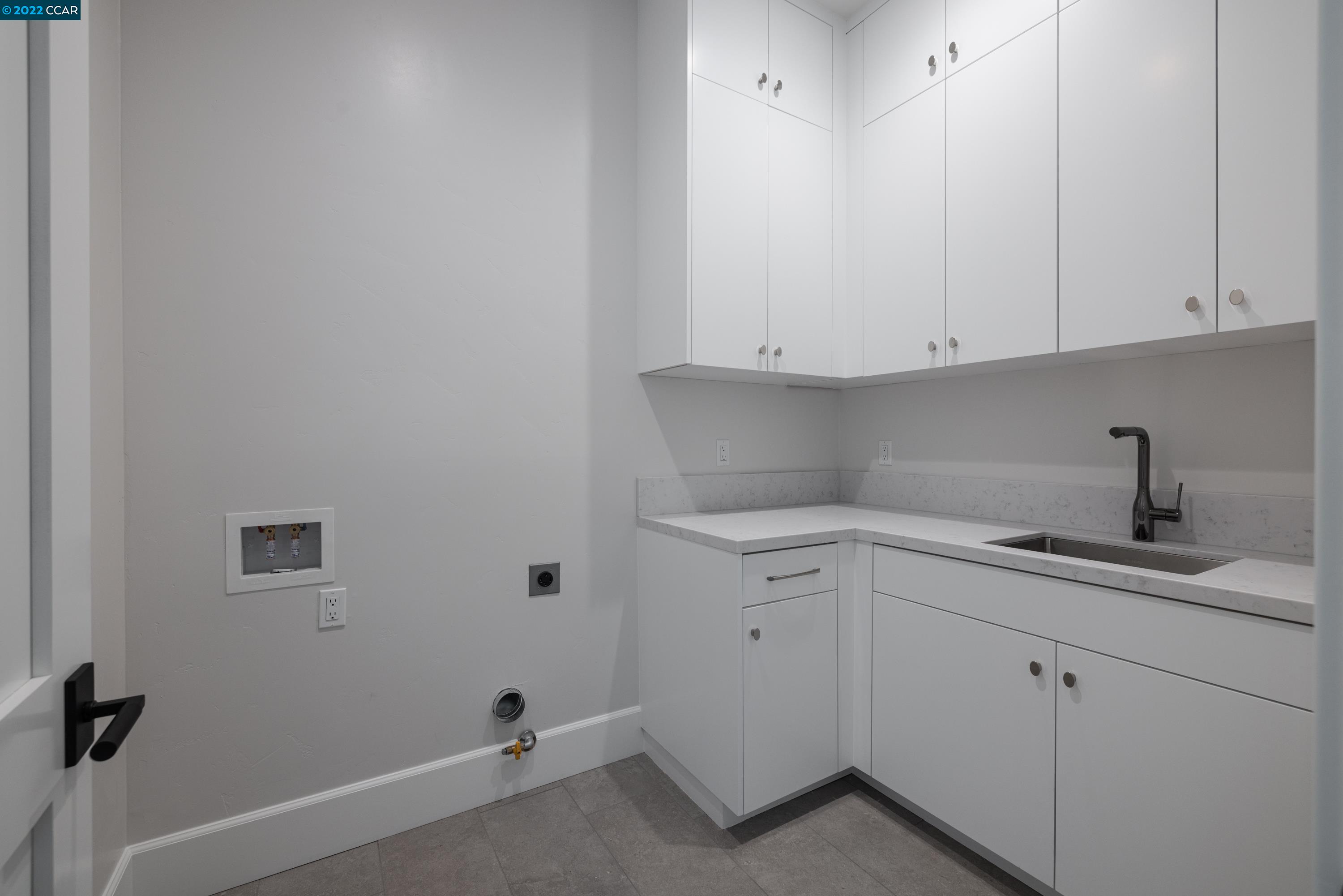 145 Arbor View Lane Lafayette, CA 94549 - Photo 23 of 46 a view of cabinets and utility room with a sink