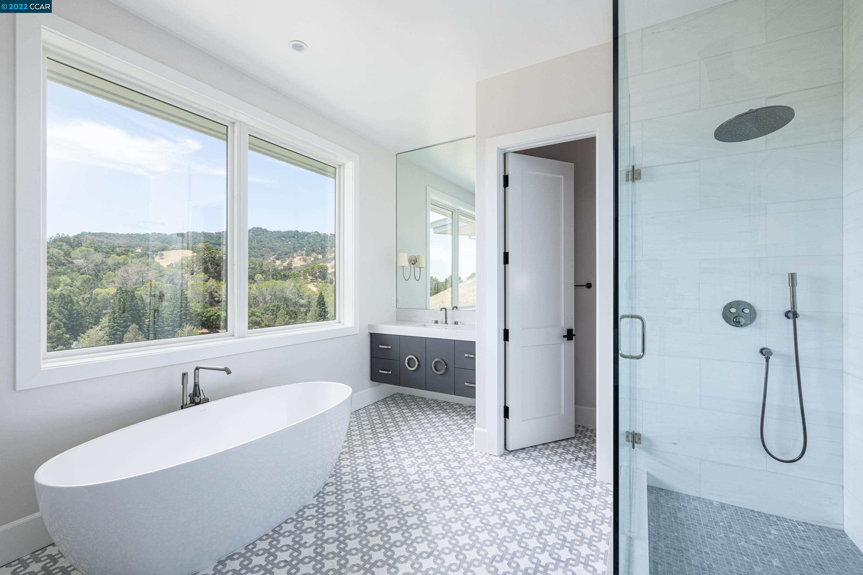 145 Arbor View Lane Lafayette, CA 94549 - Photo 31 of 46 a bathroom with a tub shower and window