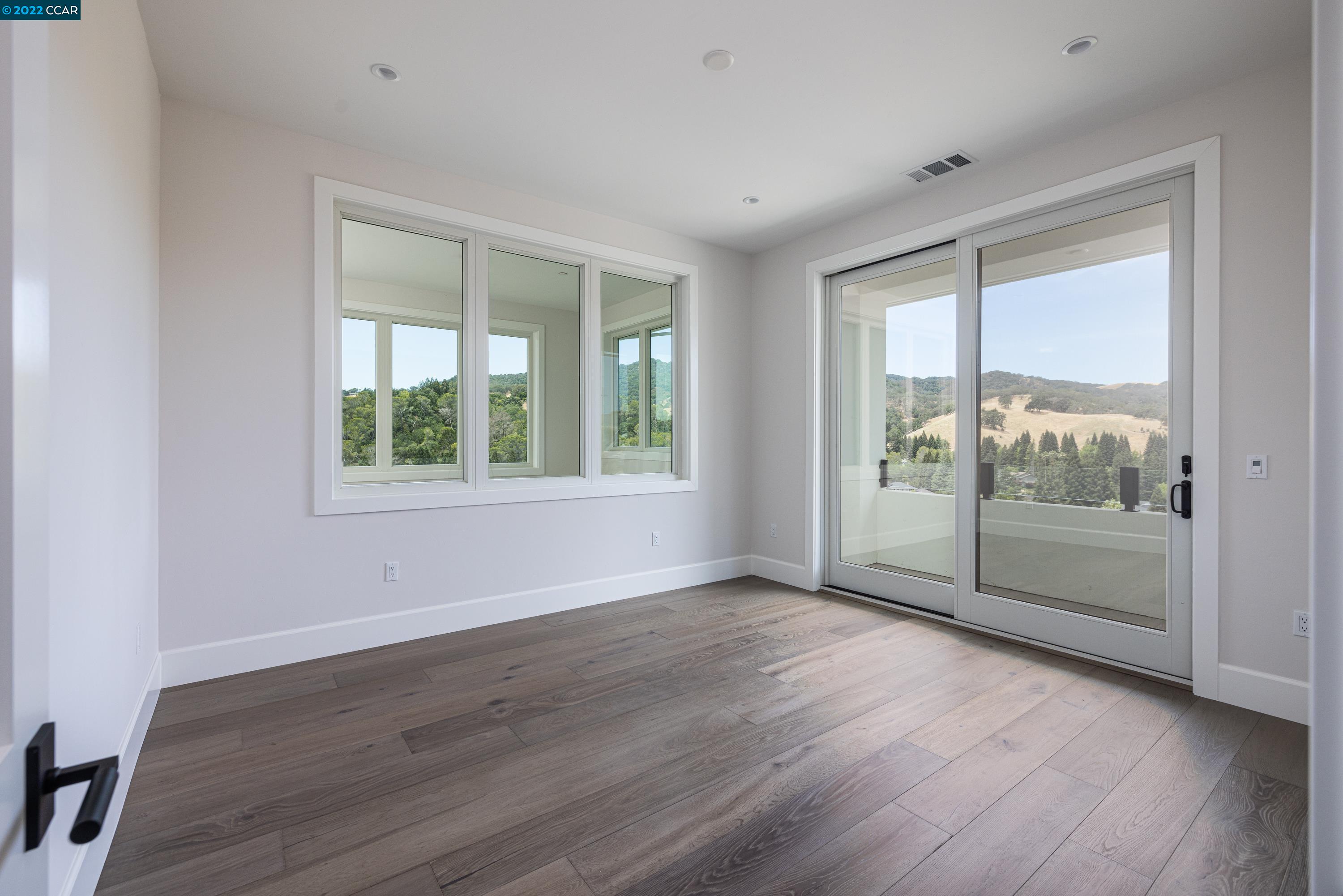 145 Arbor View Lane Lafayette, CA 94549 - Photo 35 of 46 wooden floor in an empty room with a window