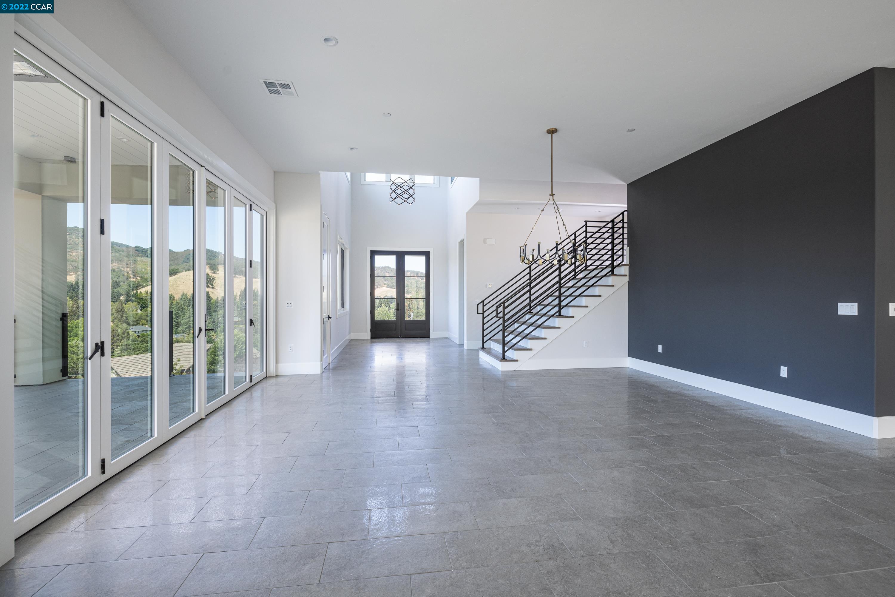 145 Arbor View Lane Lafayette, CA 94549 - Photo 8 of 46 a view of a hallway with windows and stairs