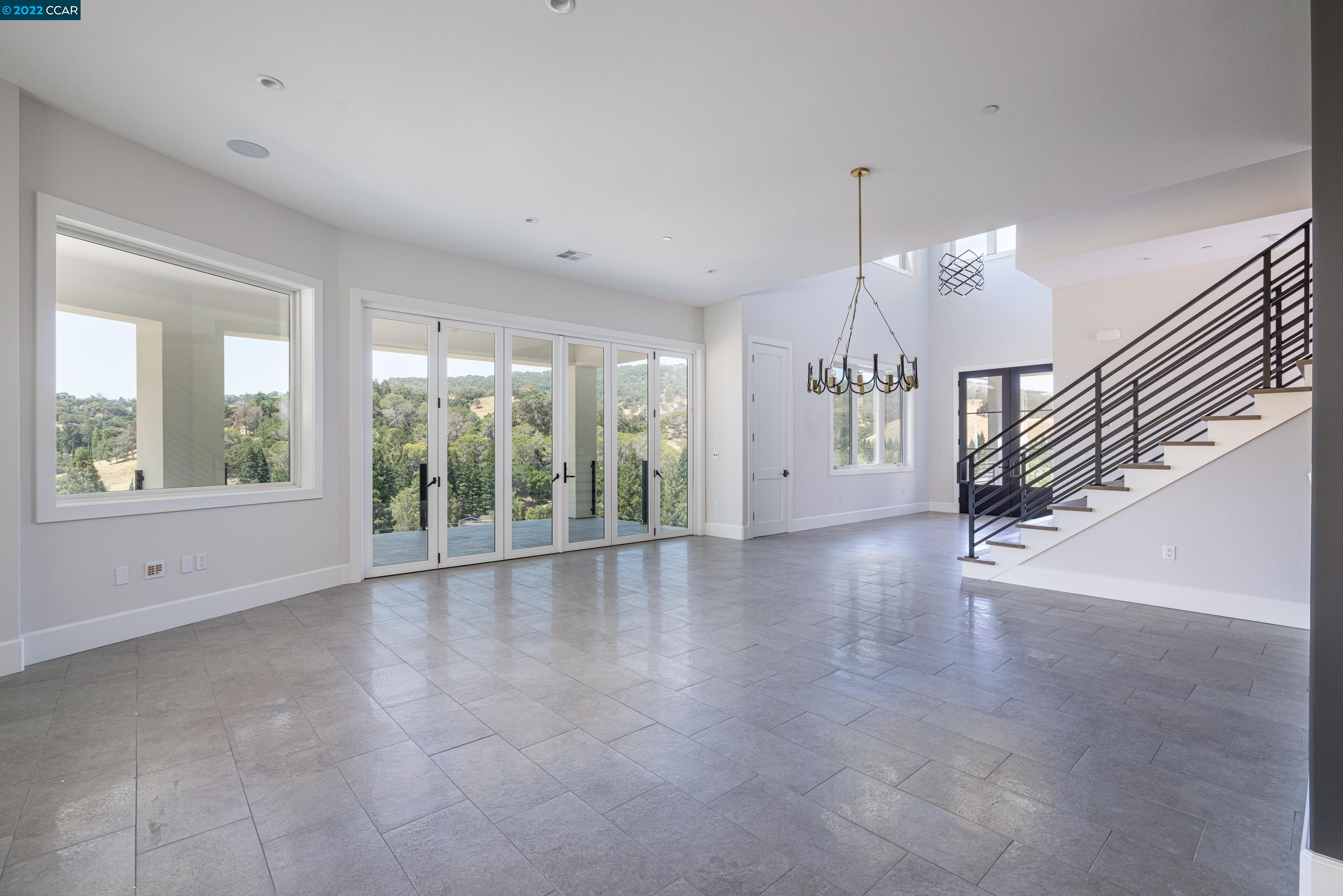 145 Arbor View Lane Lafayette, CA 94549 - Photo 9 of 46 a view of an empty room with windows