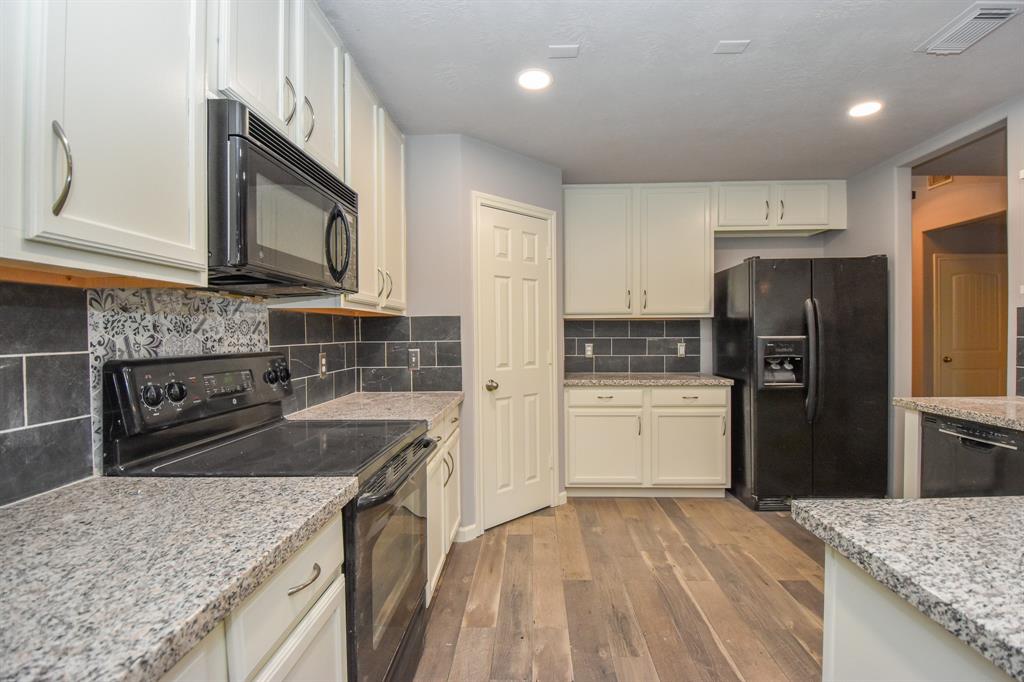 Wonderfully Updated Home for lease.  Ready for move in!  Updated kitchen with granite counters and tile back splash.  Notice the beautiful designer tile as an accent behind the flat burner stove.