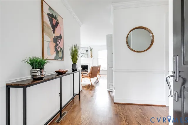 a view of a living room and bathroom