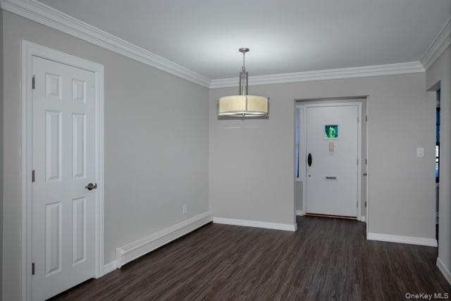 1593 August Road, Unit 1767 North Babylon, NY 11703 - Photo 5 of 10 wooden floor in an empty room with a window