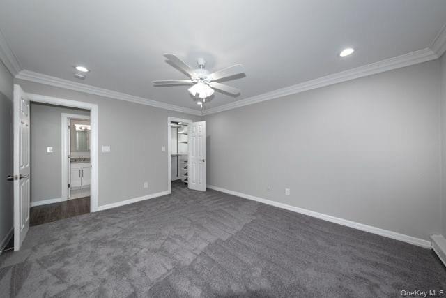 1593 August Road, Unit 1767 North Babylon, NY 11703 - Photo 7 of 10 an empty room with a ceiling fan and a bathroom