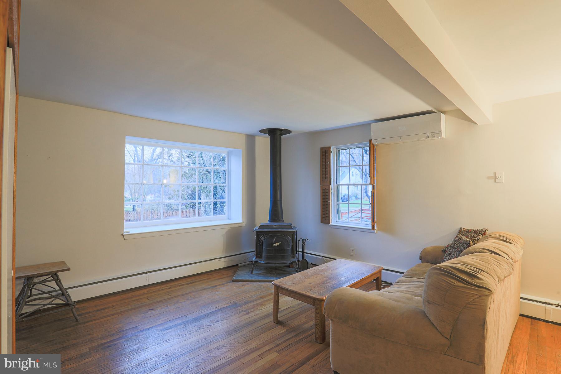 1010 Kingston Road Baltimore, MD 21208 - Photo 12 of 43 Living room with wood-burning stove