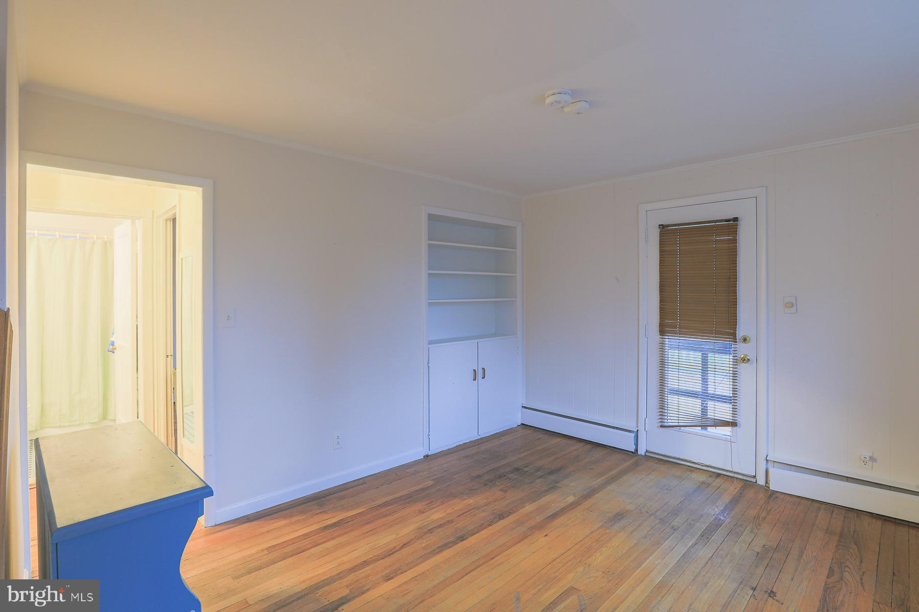 1010 Kingston Road Baltimore, MD 21208 - Photo 16 of 43 Family room with door to deck