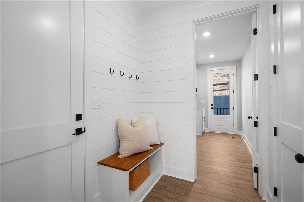 1783 4 Mile Church Road Ball Ground, GA 30107 - Photo 33 of 60 a hallway with wooden floor