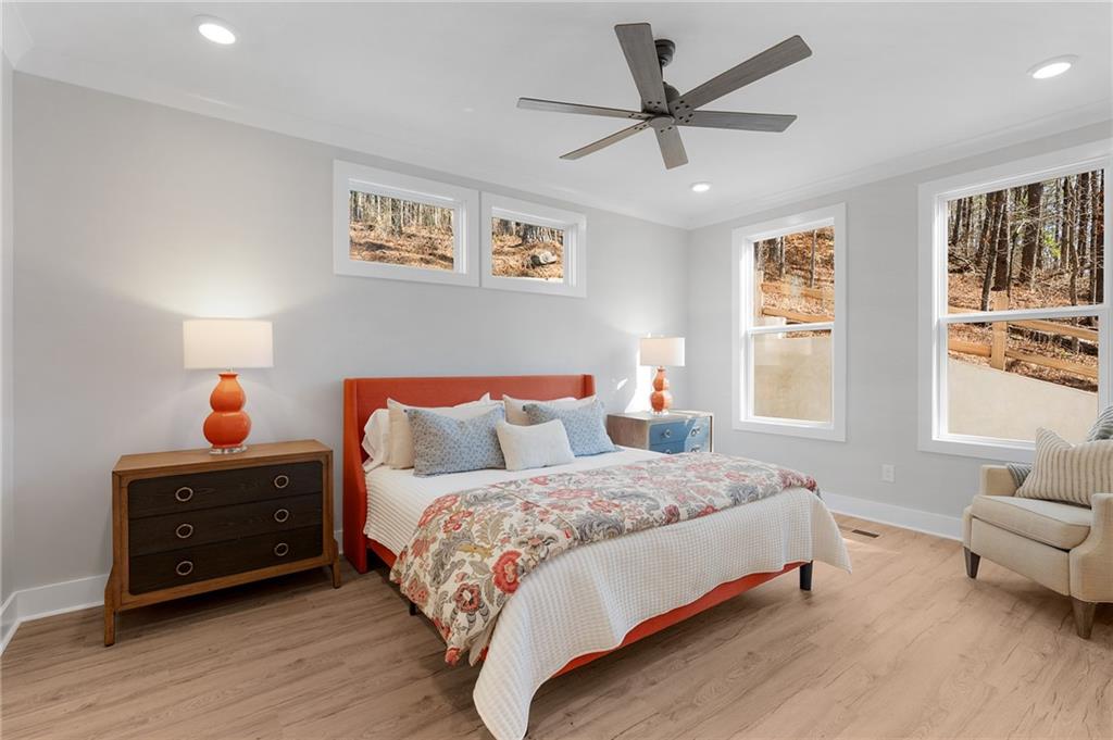 1783 4 Mile Church Road Ball Ground, GA 30107 - Photo 38 of 60 a bedroom with bed and window