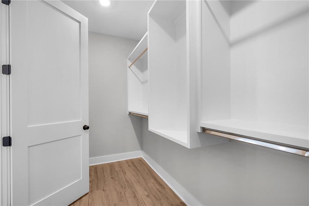 1783 4 Mile Church Road Ball Ground, GA 30107 - Photo 39 of 60 a view of room with stairs and wooden floor