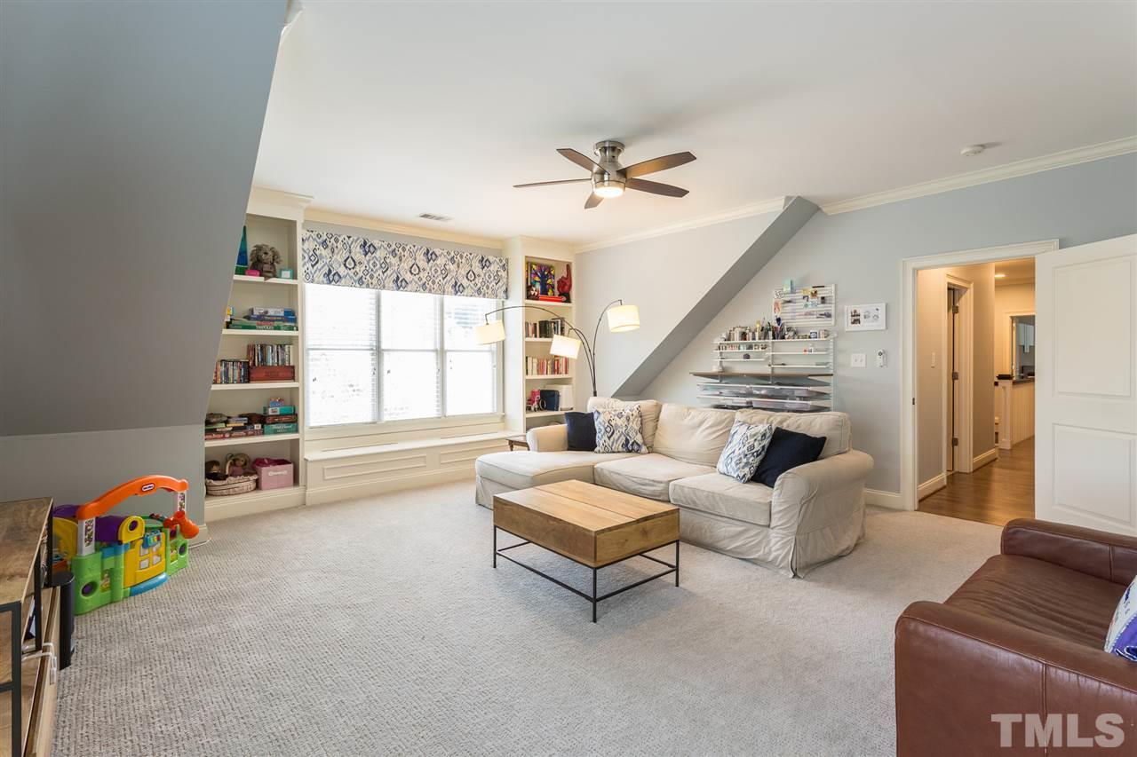 1716 Stannard Trail Raleigh, NC 27612 - Photo 22 of 30 The light-filled bonus room is the perfect space for fun and games and provides the perfect location for your large flat screen. Double bookcases frame a window seat. It also has access to a full bath.