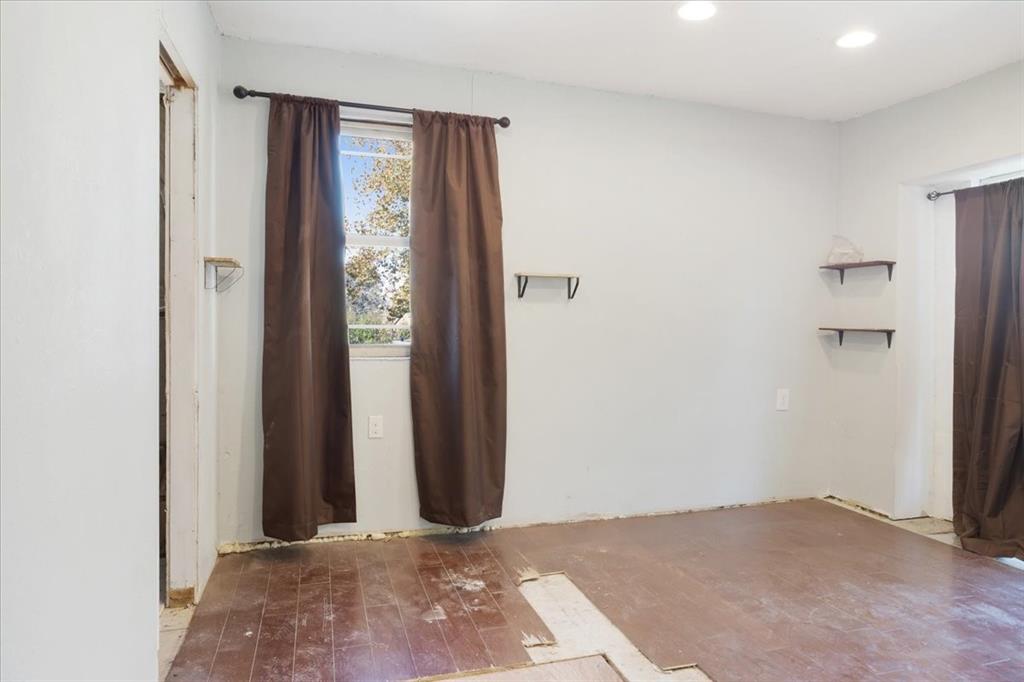 203 South Carter Street Whitewright, TX 75491 - Photo 8 of 18 Primary bedroom with recessed lighting