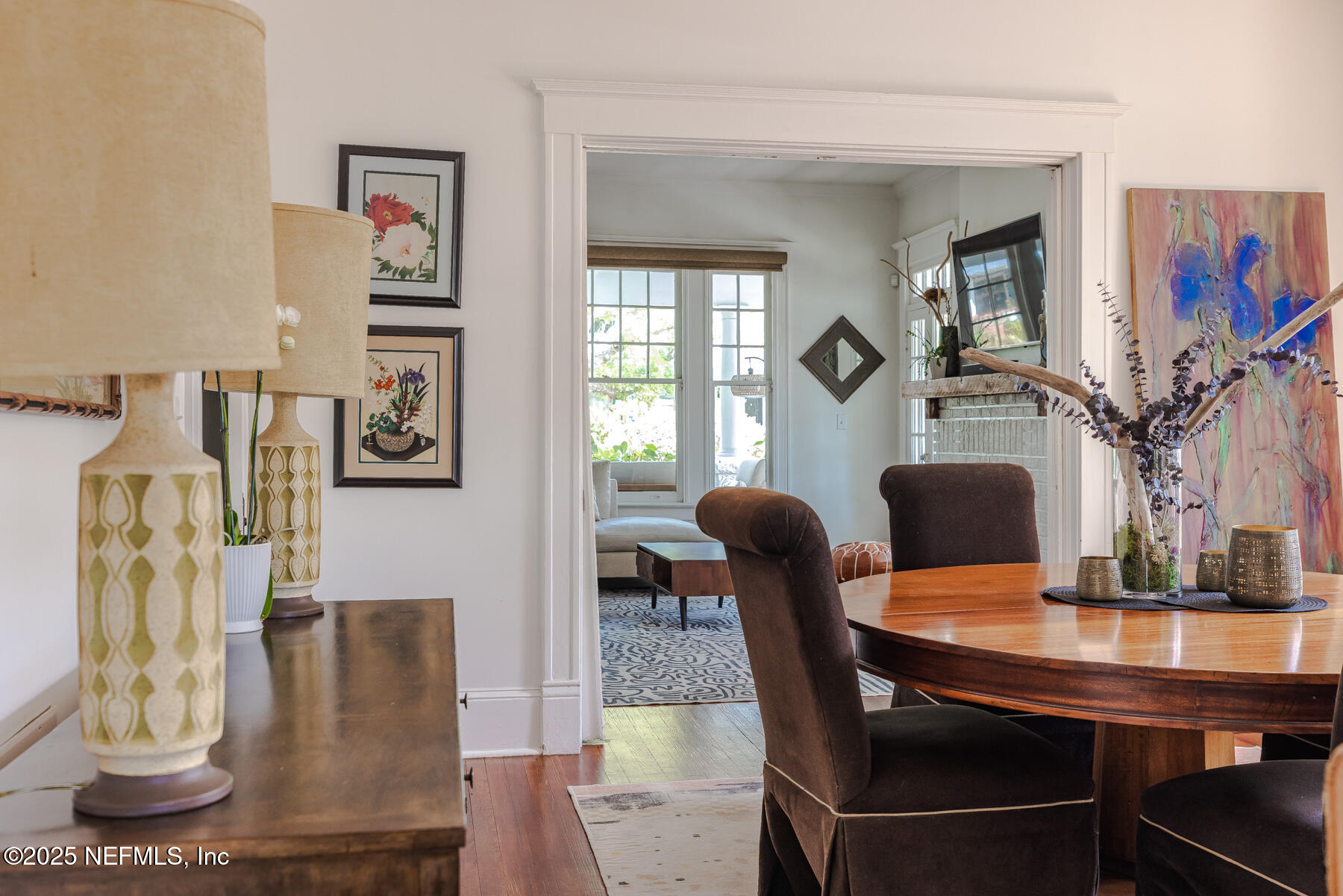 2122 Post Street Jacksonville, FL 32204 - Photo 22 of 69 a view of a dining room with furniture a potted plant and wooden floor