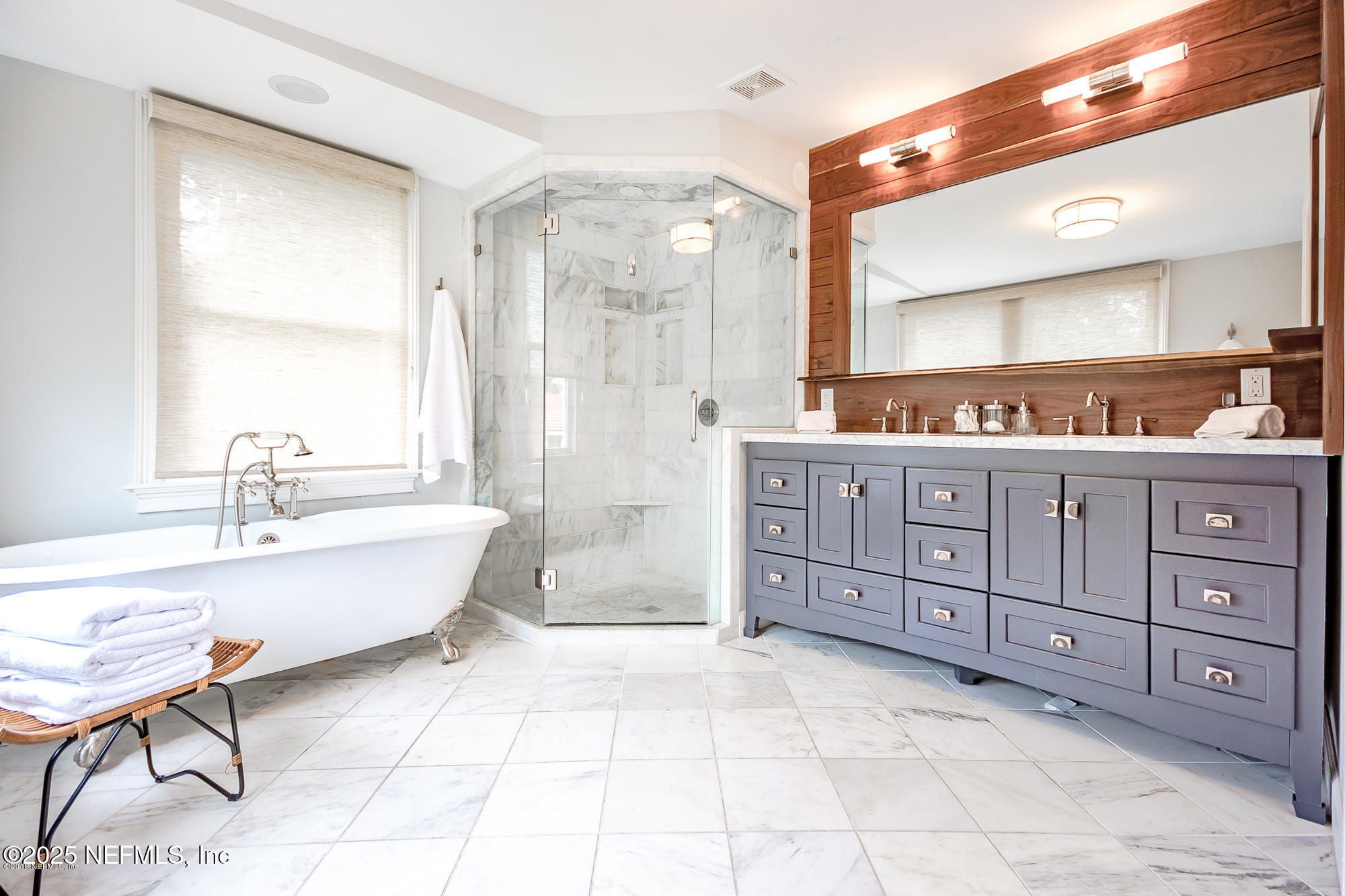 2122 Post Street Jacksonville, FL 32204 - Photo 44 of 69 a large spacious bathroom with a tub sink and mirror