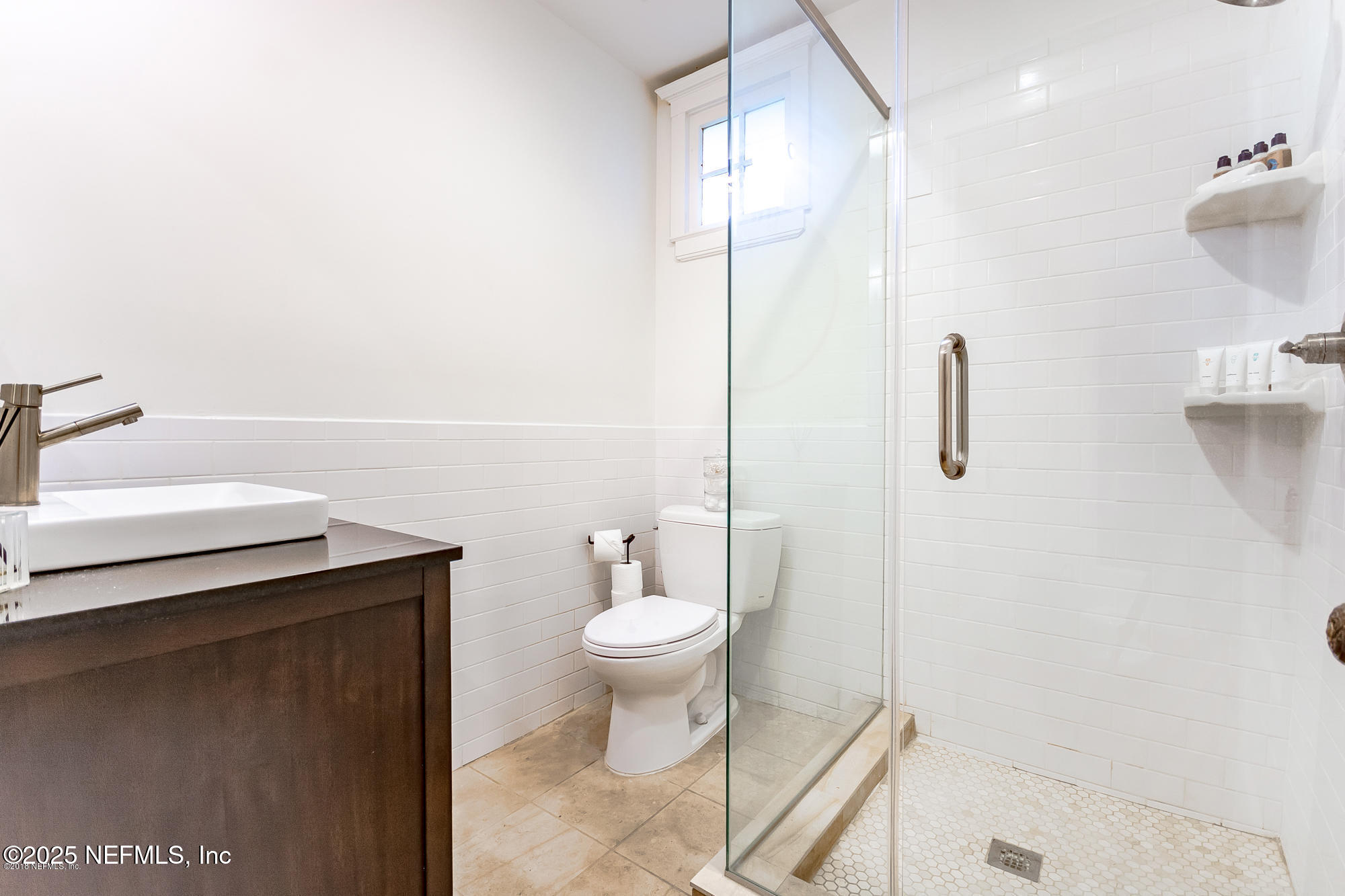 2122 Post Street Jacksonville, FL 32204 - Photo 51 of 69 a bathroom with a sink a toilet and a shower