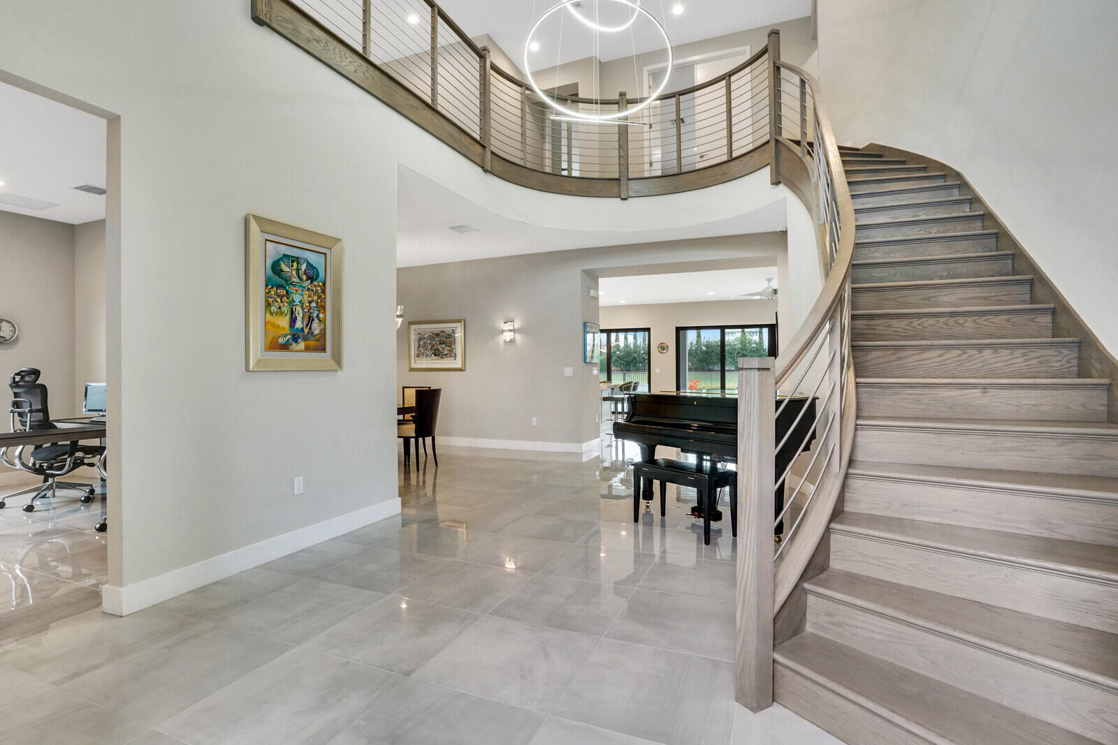 8830 New River Falls Road Boca Raton, FL 33496 - Photo 5 of 95 WOOD STAIRCASE W/ WOOD RAILING