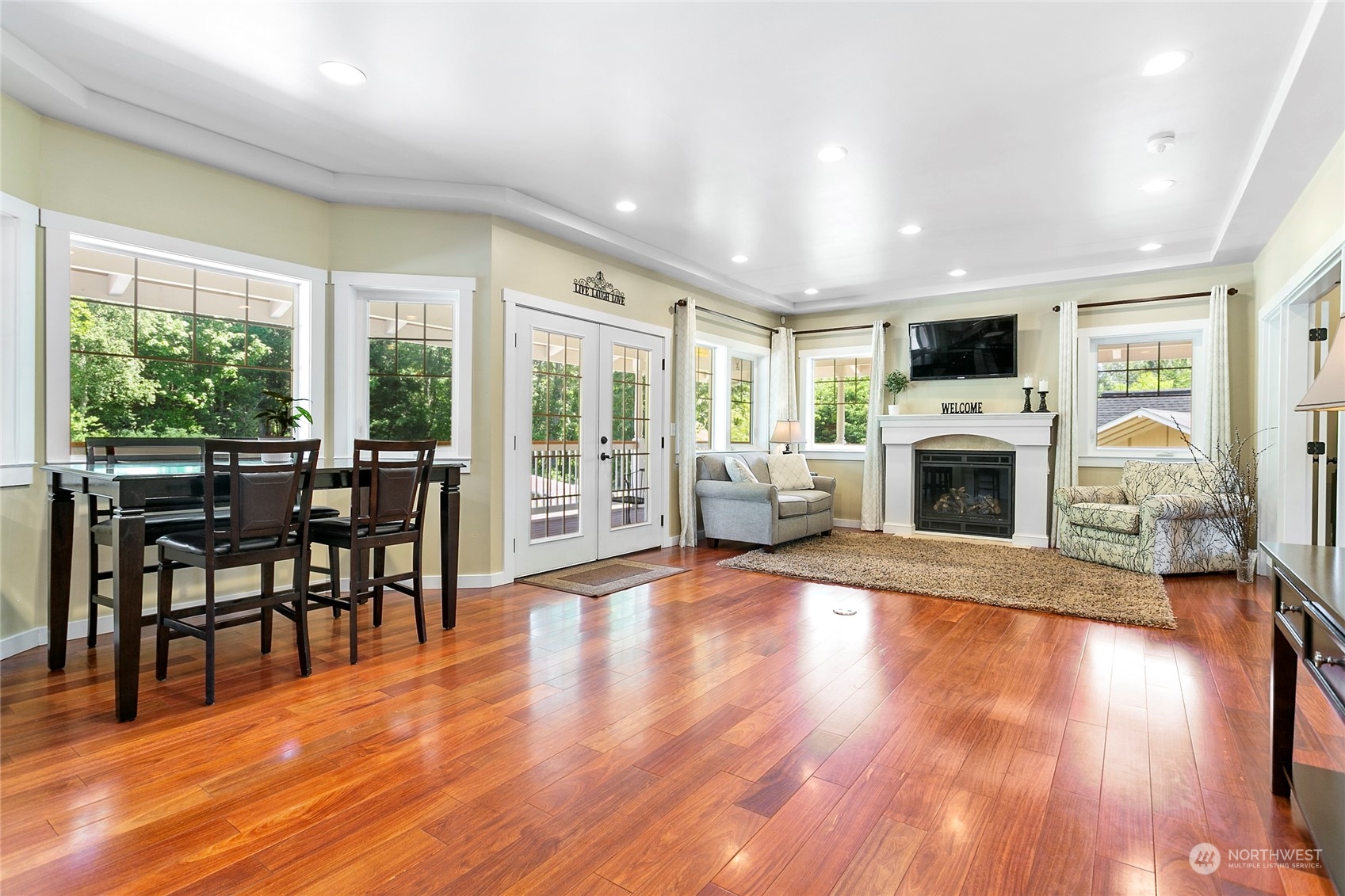 3460 Aldergrove Road Ferndale, WA 98248 - Photo 12 of 39 a living room with furniture fireplace and wooden floor