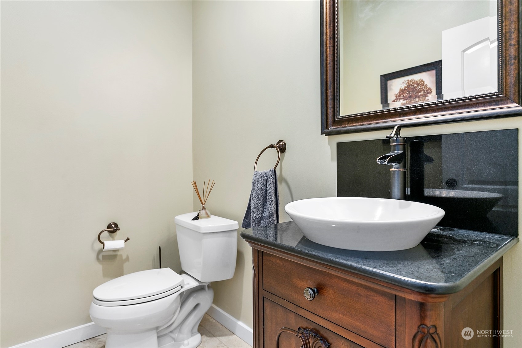 3460 Aldergrove Road Ferndale, WA 98248 - Photo 15 of 39 a bathroom with a sink a toilet and mirror