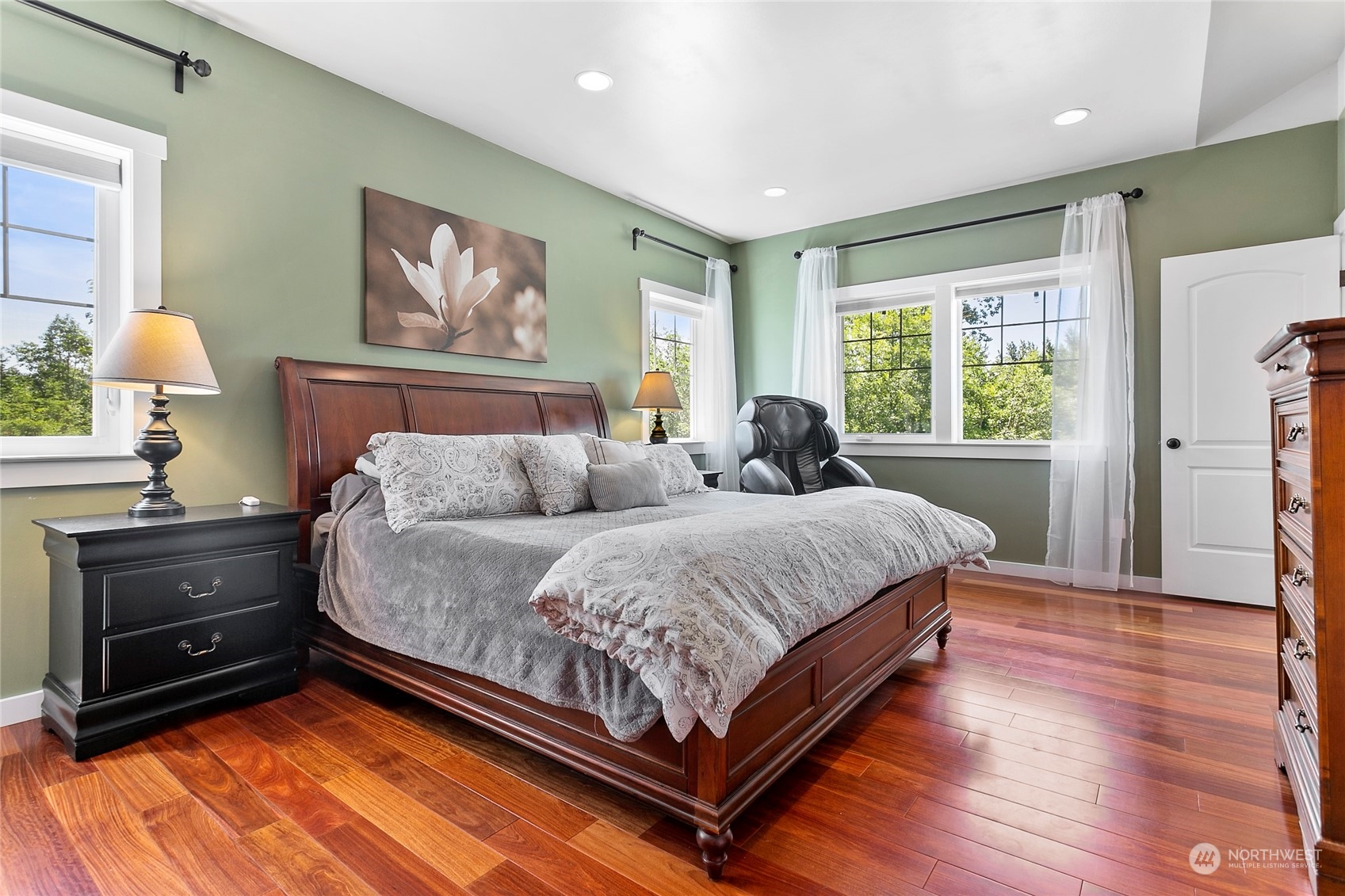 3460 Aldergrove Road Ferndale, WA 98248 - Photo 18 of 39 a spacious bedroom with a bed and wooden floor