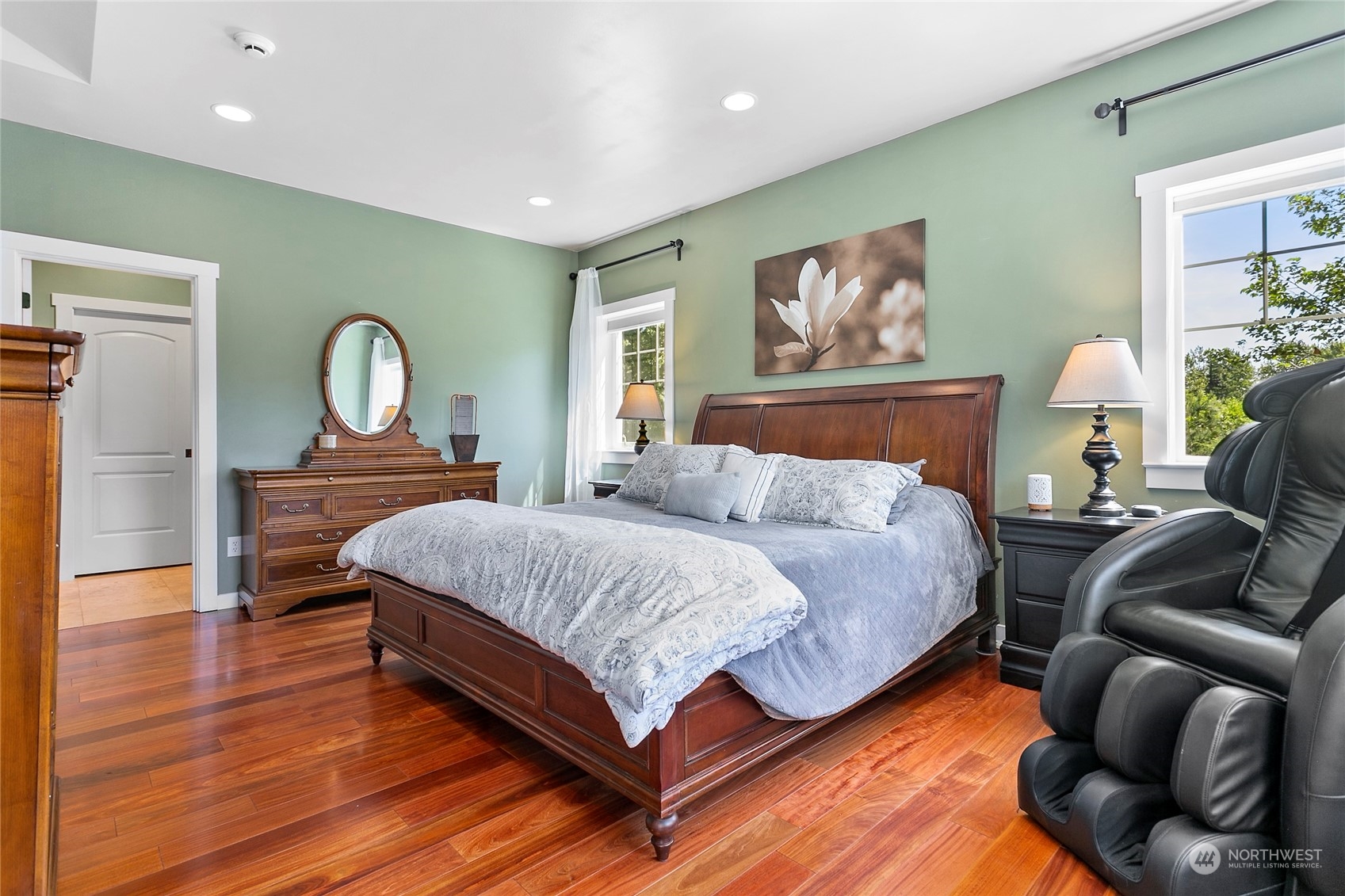 3460 Aldergrove Road Ferndale, WA 98248 - Photo 19 of 39 a bed room with a bed and a painting on the wall