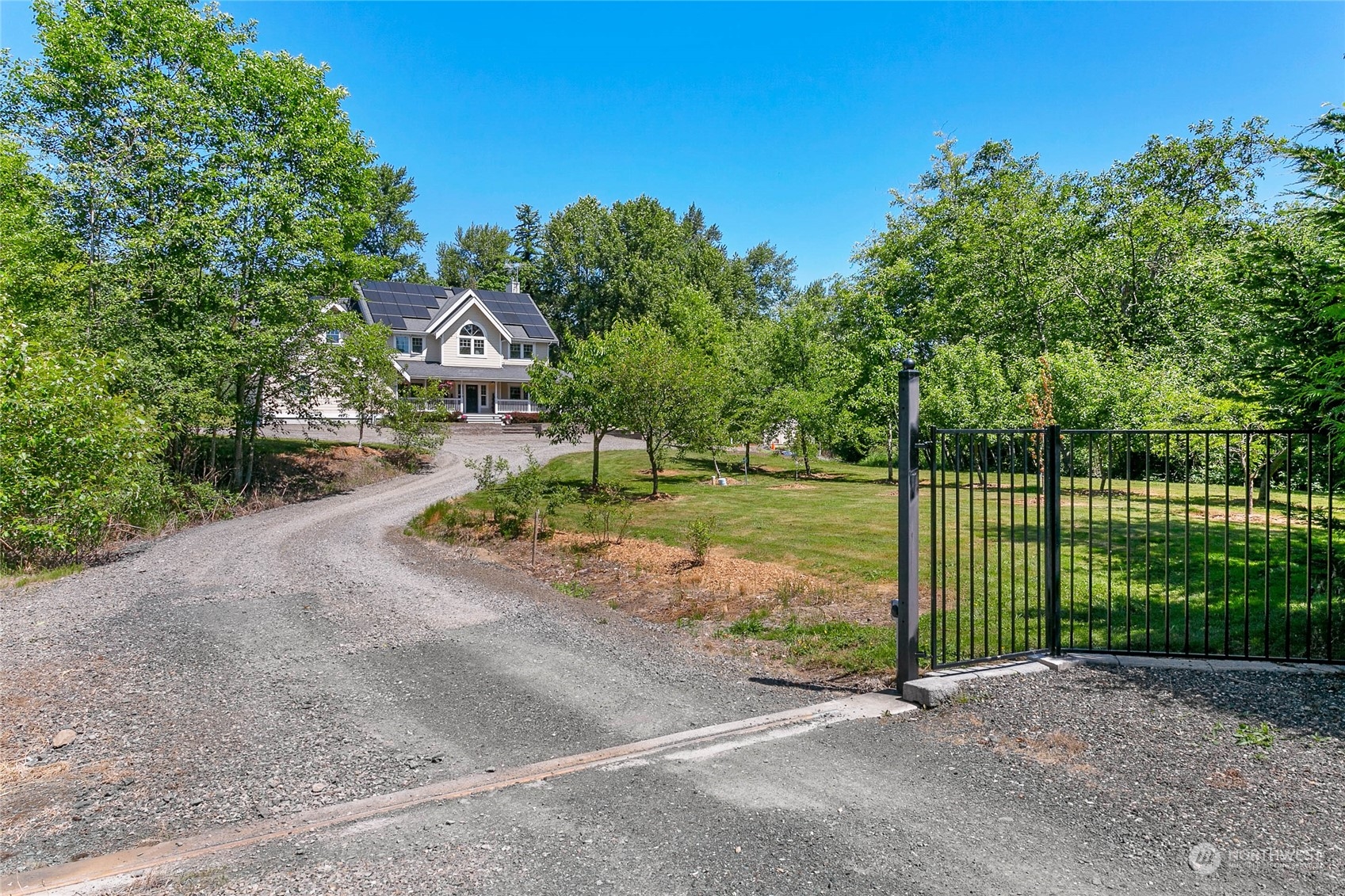 3460 Aldergrove Road Ferndale, WA 98248 - Photo 2 of 39 a view of a house with a backyard and a street