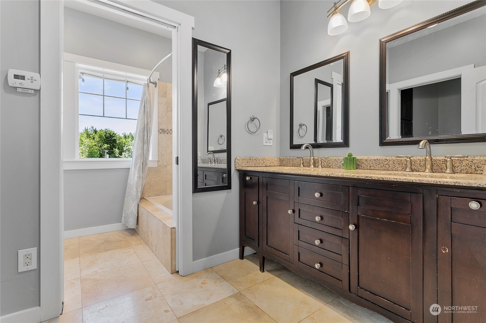 3460 Aldergrove Road Ferndale, WA 98248 - Photo 25 of 39 a bathroom with a granite countertop sink and a mirror