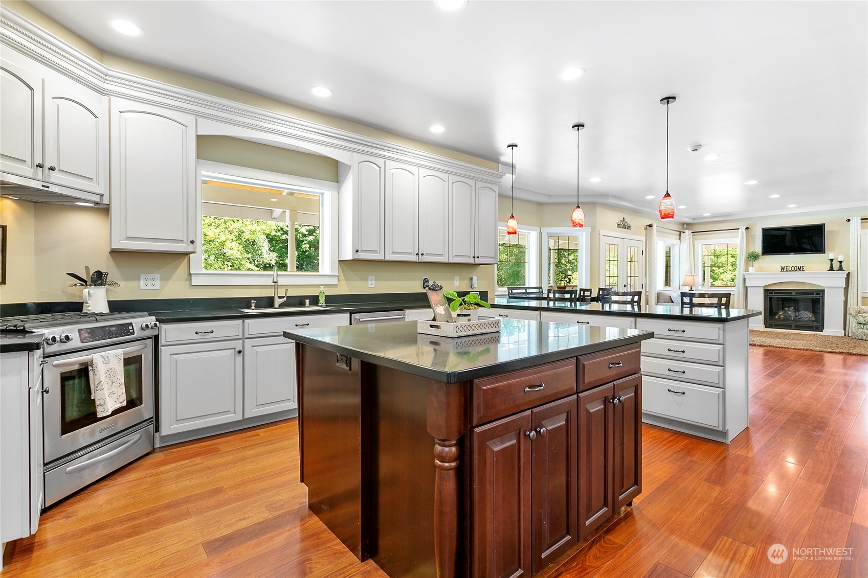 3460 Aldergrove Road Ferndale, WA 98248 - Photo 9 of 39 a kitchen with stainless steel appliances granite countertop a sink stove and refrigerator