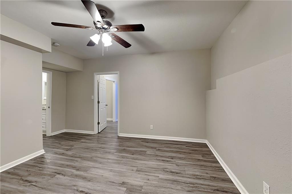 192 Seals Drive Dallas, GA 30157 - Photo 17 of 20 wooden floor in an empty room