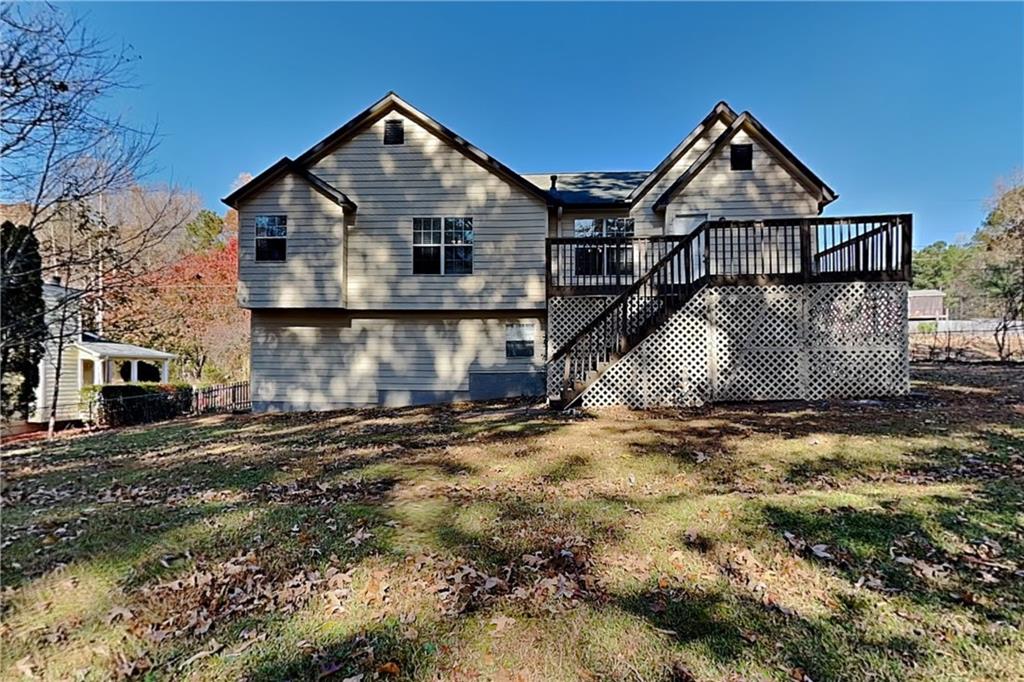 192 Seals Drive Dallas, GA 30157 - Photo 18 of 20 a front view of a house with a yard