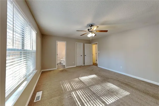 a view of a room with a large window