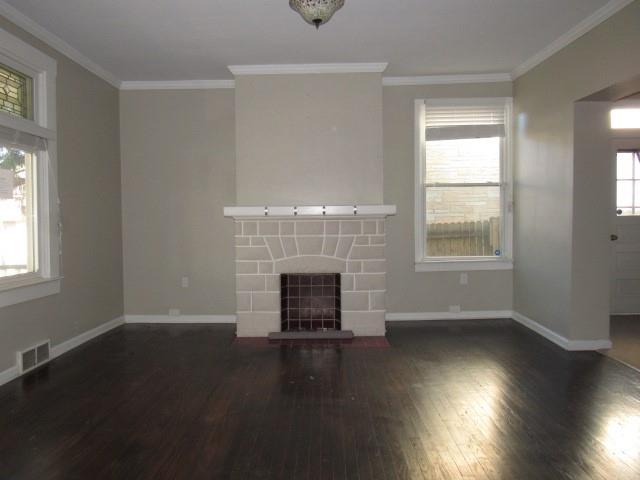 130 Noble Avenue Pittsburgh, PA 15205 - Photo 7 of 21 an empty room with wooden floor fireplace and windows
